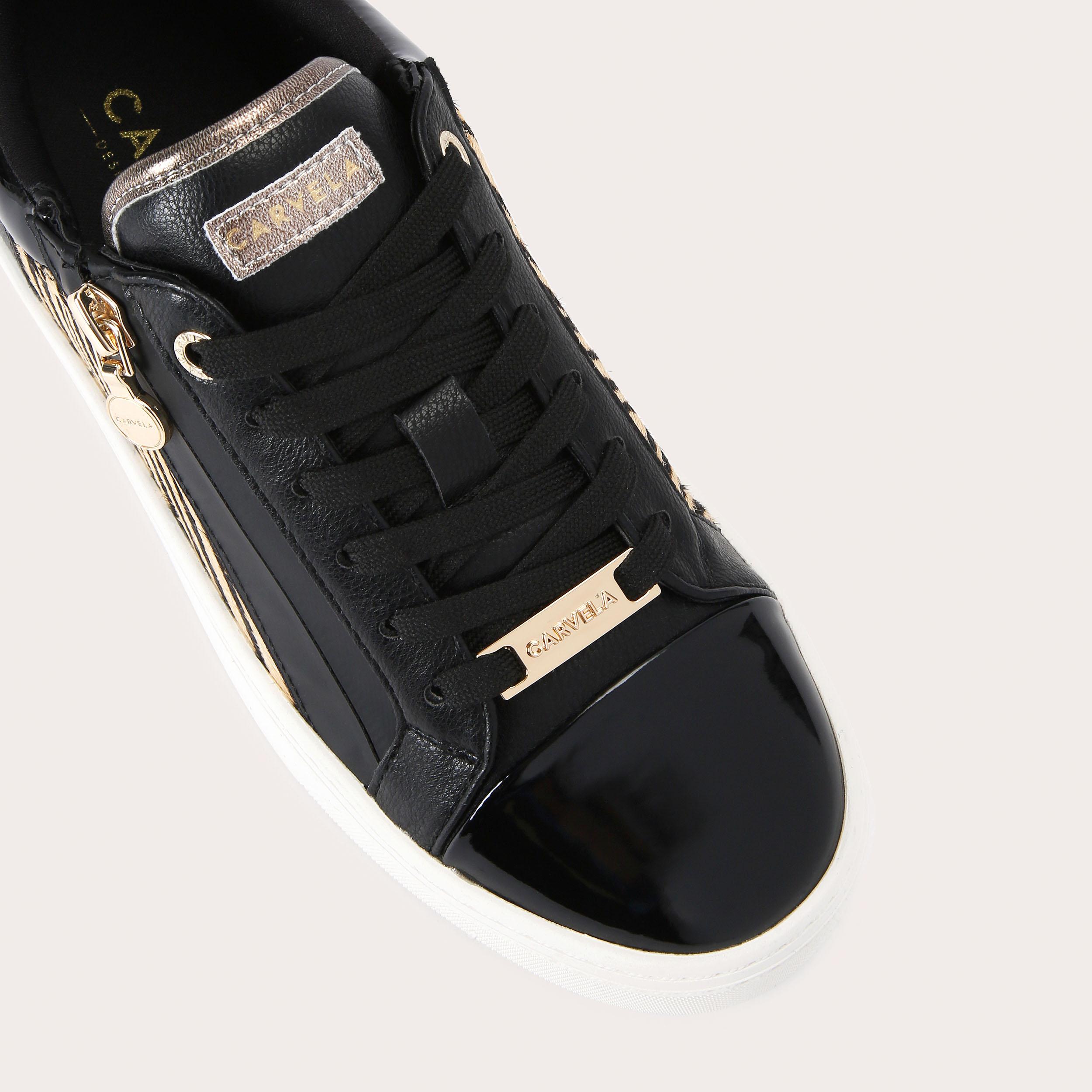 STATEMENT ZIP Zebra Textured Sneaker by CARVELA